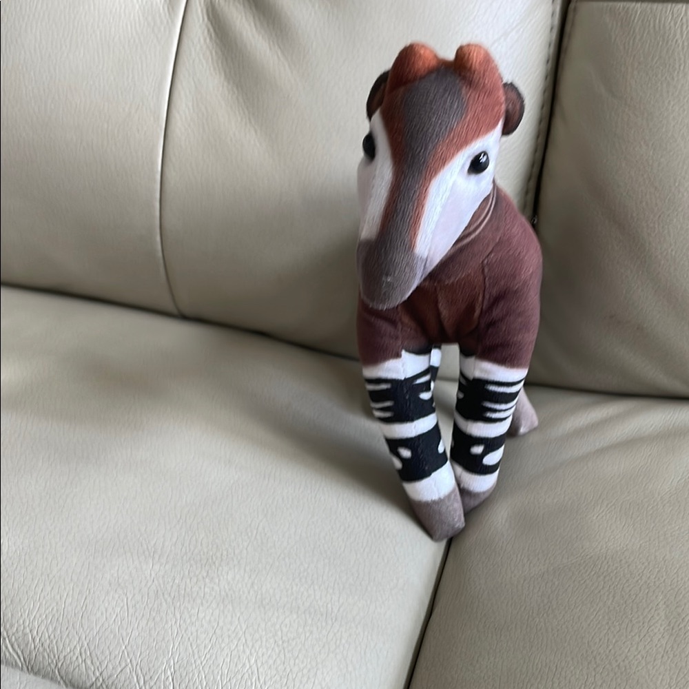 Brown and Black Plush Animal Toy